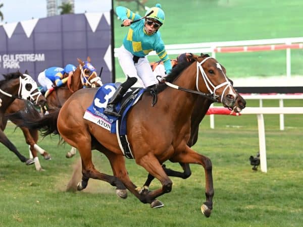 Irad Ortiz, Jr. celebrates Atone's win in the $1M Pegasus Turf Cup Inv. (G1) - Coglianese photo