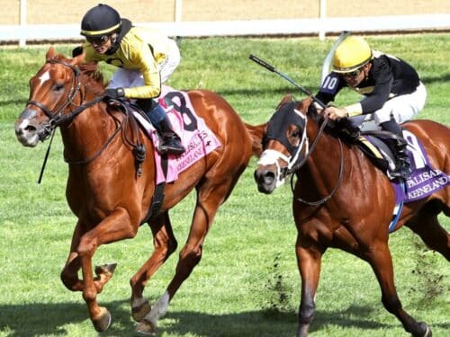 Reb Five, at left, rolls by Throckmorton in the final strides of Keeneland's Palisades S. - John Gallagher
