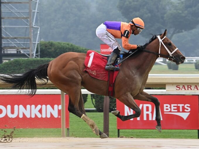 Effusive, the daughter of Into Mischief/Monomoy Girl, splashes to victory in her July 18 career debut at Saratoga - Susie Raisher