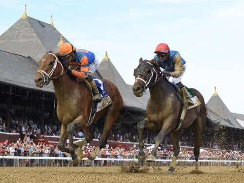 Renegade (at left) reels in Commandment in the final strides of the Jim Dandy S. (G2) - NYRA photo