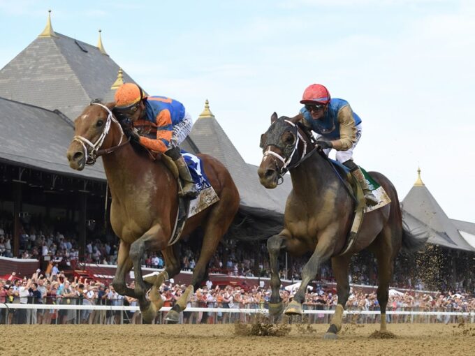 Renegade (at left) reels in Commandment in the final strides of the Jim Dandy S. (G2) - NYRA photo